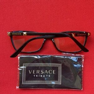Versace Women's Black and Gold Glasses